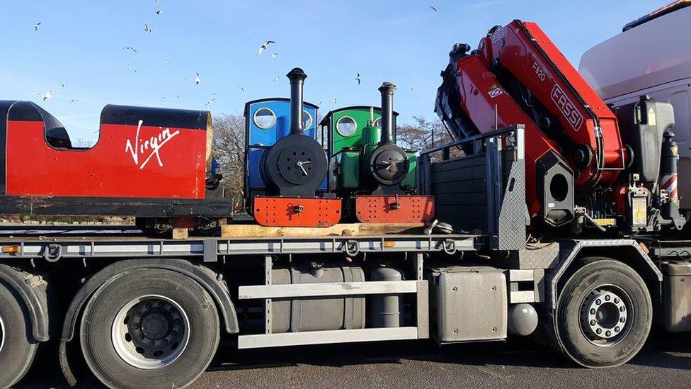 trains on lorry