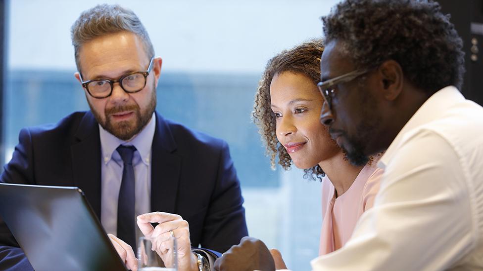 Mortgage adviser with couple