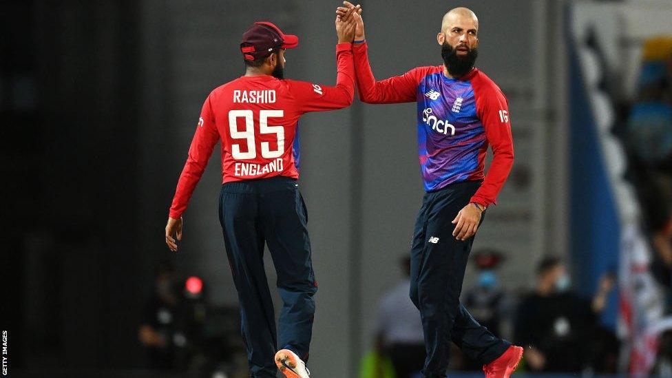 Moeen Ali and Adil Rashid high-fiving