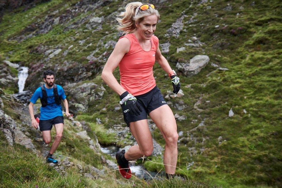 Beth Pascall running across one of the fells as part of the Bob Graham Round