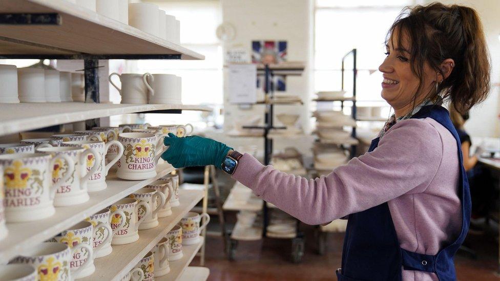 King Charles III themed mugs on display during the production of hand-decorated pieces from the forthcoming Coronation collection, at the Emma Bridgewater Pottery Factory in Stoke on Trent.