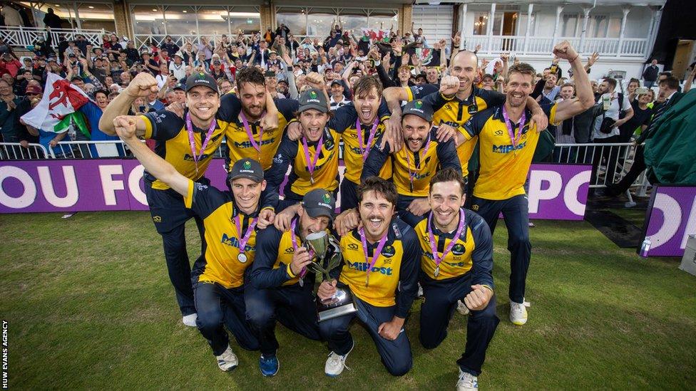 Glamorgan team celebrating with One-Day Cup