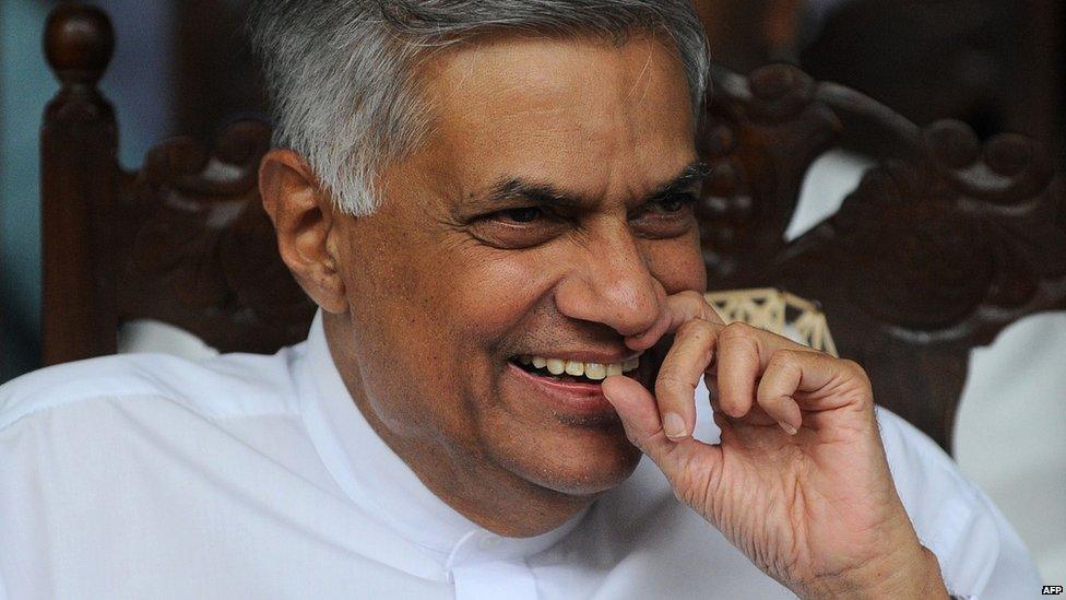 Sri Lanka's Prime Minister Ranil Wickramasinghe smiles during a convention of his United National Party (UNP) in Colombo on July 11, 2015