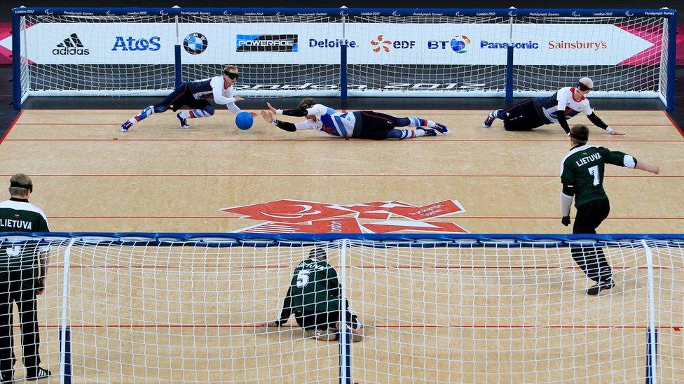 Michael Sharkey (left), Niall Graham and Adam Knott (right) in action against Lithuania during the Mens's Goalball at the Copper Box. London.