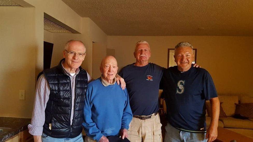 Raffaele Minichiello (far left) and Otis Turner (far right) at a military reunion