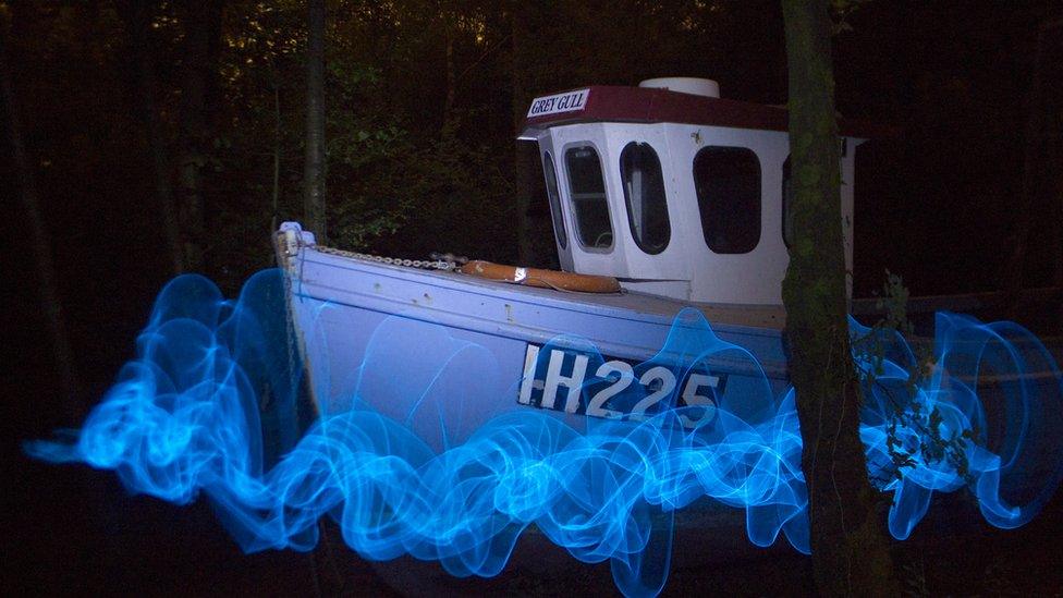 A light sea painted round a boat