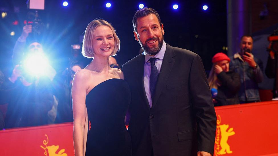 Carey Mulligan and Adam Sandler attend the screening of the movie 'Spaceman' at the 74th Berlinale International Film Festival in Berlin, Germany, February 21, 2024