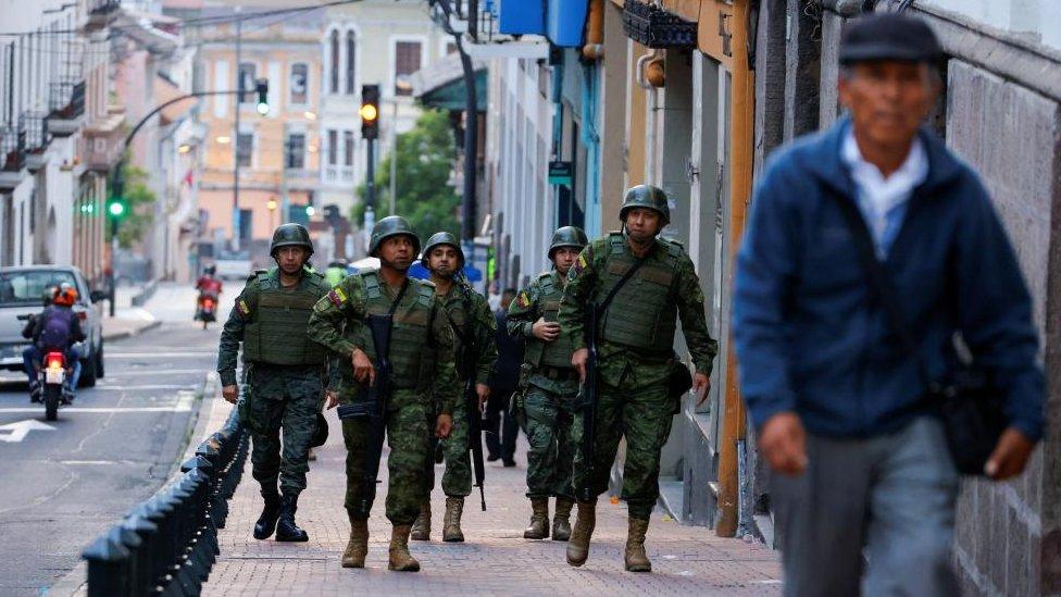 Soldiers patrol the city's historic centre following an outbreak of violence a day after Ecuador's President Daniel Noboa declared a 60-day state of emergency following the disappearance of Adolfo Macias, leader of the Los Choneros criminal gang from the prison where he was serving a 34-year sentence, in Quito, Ecuador, January 9, 2024