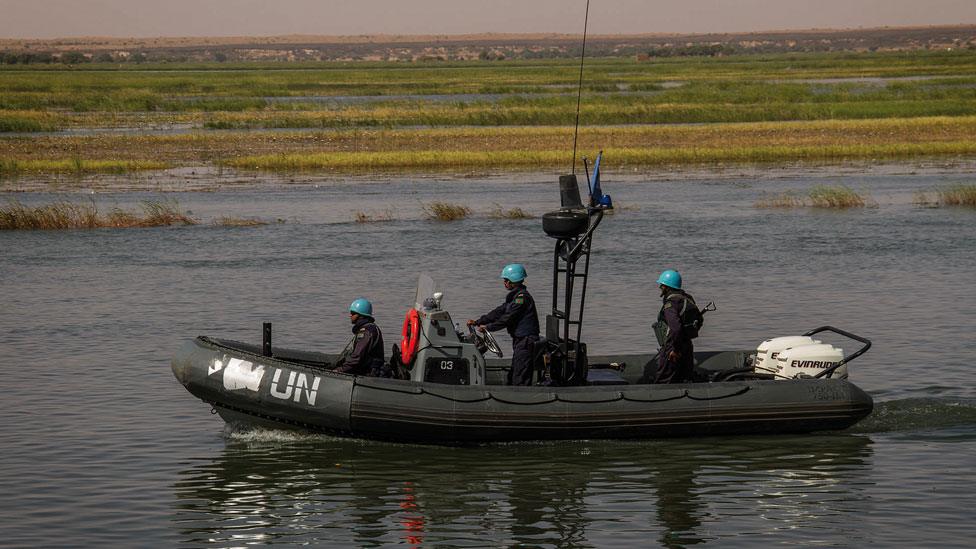 Peacekeepers on boats on the Niger River, Mali