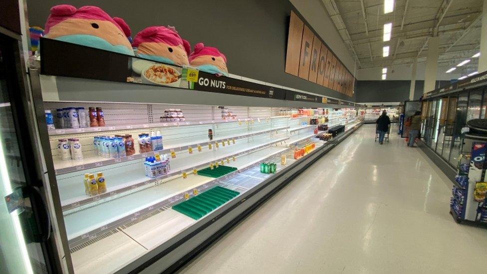 Near-empty shelves line a grocery store in Kelowna, following catastrophic flooding in British Columbia, Canada, in this November 17, 2021 photo obtained from social media