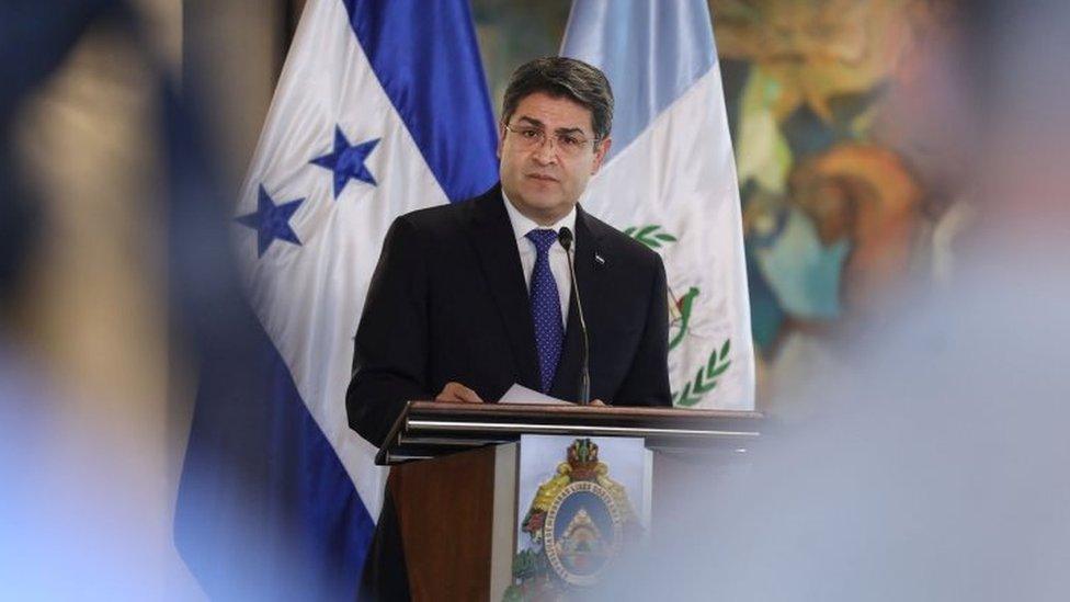 Honduras President Juan Orlando Hernandez speaks during a news conference with Guatemala's President Jimmy Morales (unseen), for the situation of the large caravan of Central American migrants trying to reach the United States, in Tegucigalpa, Honduras November 5, 2018.