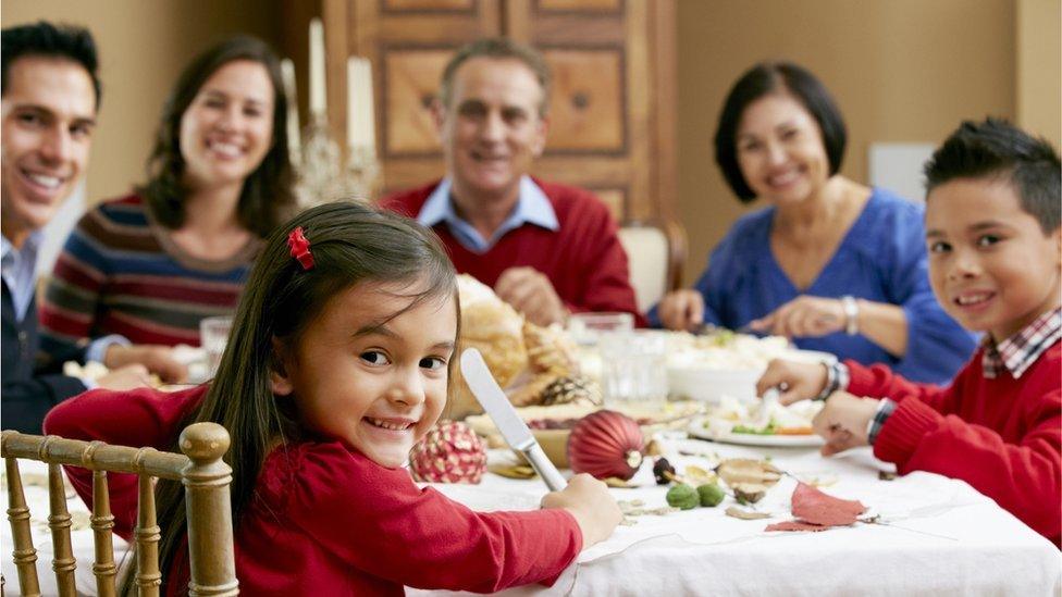 Family eating Christmas dinner