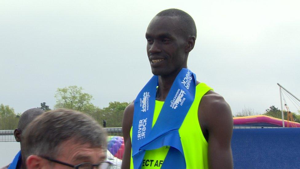 Eric Koech won the men's race in a time of 2:18:19