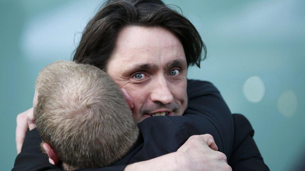 Relatives embrace after the jury delivered its verdict at the new inquests into the Hillsborough disaster, in Warrington