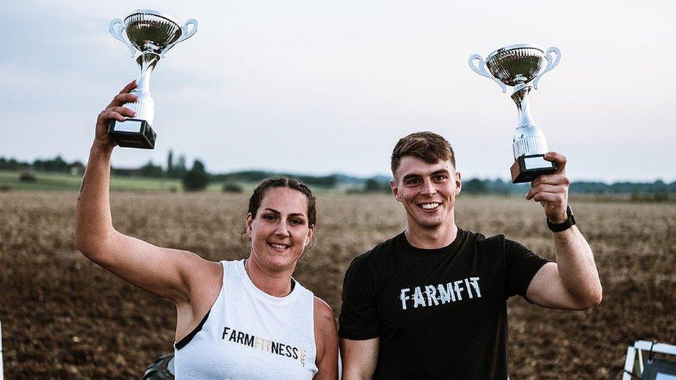 Erica and James with their trophies