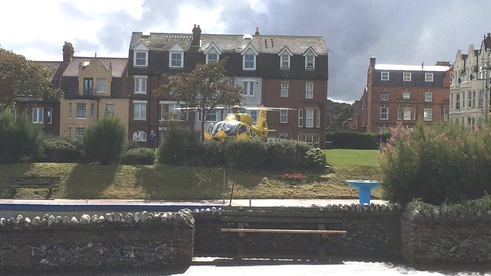 The air ambulance at Cromer after a paraglider crashed into The Wellington Hotel