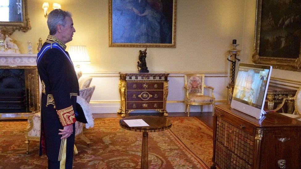 Spanish ambassador José Pascual Marco Martínez speaking with Queen via video link