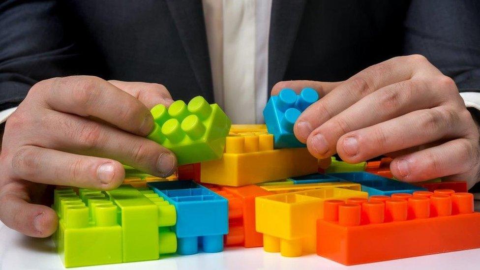 Adult hands with playbricks