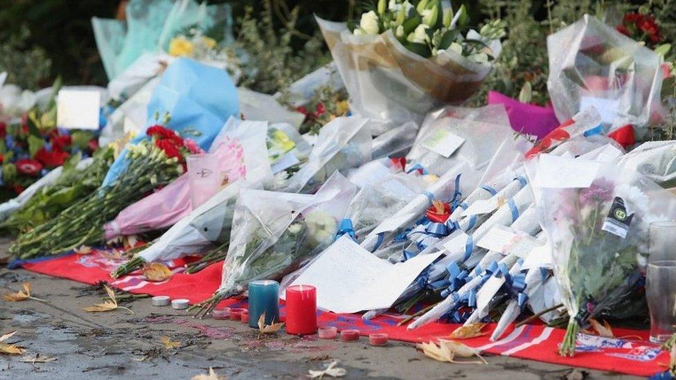 Floral tributes at tram derailment site