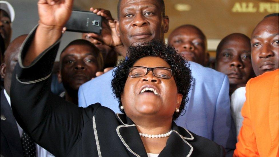 Zimbabwe's Joyce Mujuru gestures while addressing supporters in Harare, March 1, 2016.