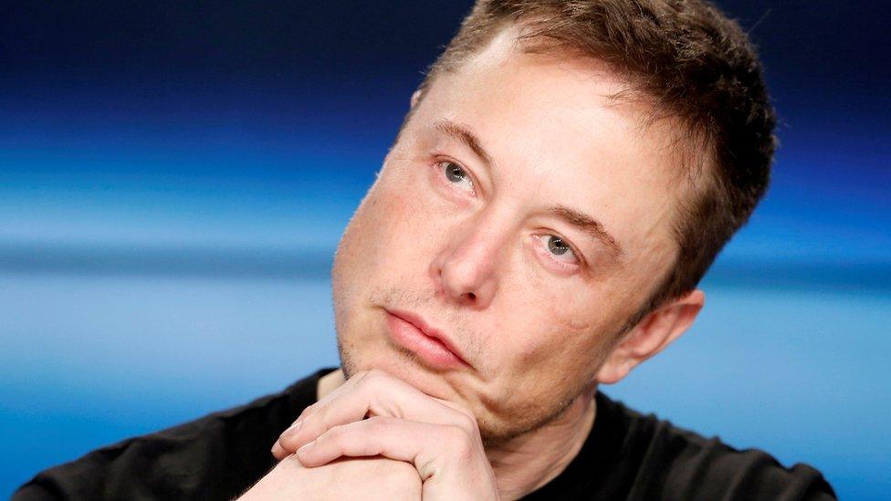 Elon Musk listens at a press conference following the first launch of a SpaceX Falcon Heavy rocket at the Kennedy Space Center in Cape Canaveral, Florida, U.S., February 6, 2018.