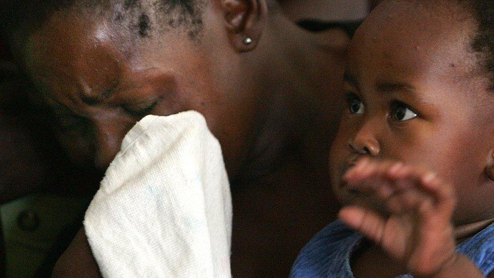 A woman cries during a press conference in Harare on April 29, 2008 as she gives her testimony of post-election violence.