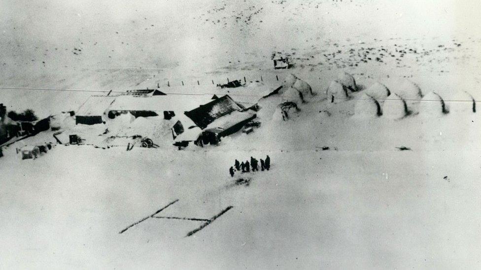 Aerial image of a far in snow