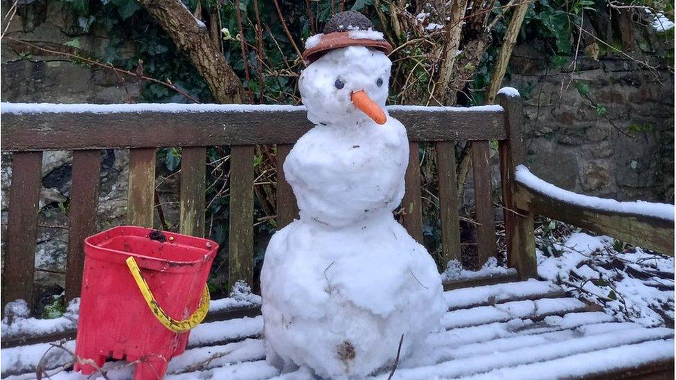 A snowman in Cardiff built by Anwen, 10 and Idris, 5