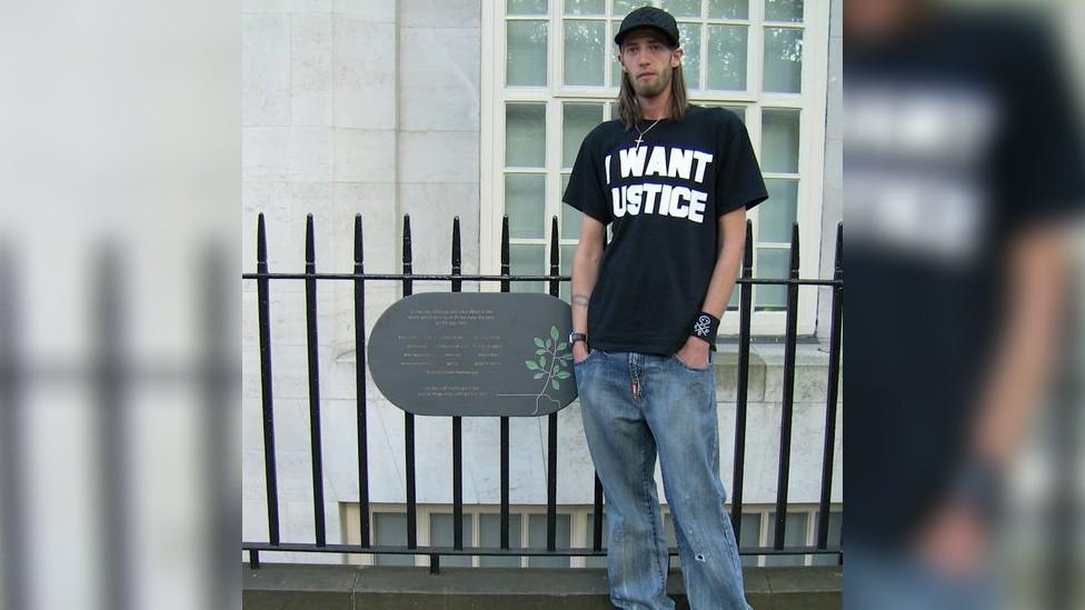 Brent next to a memorial to the victims of the 7/7 terror attacks