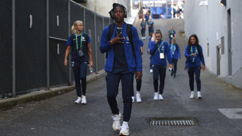 Kadeisha Buchanan leads a group of Chelsea players.