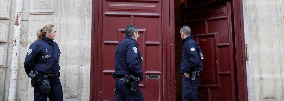 Police guard the hotel residence where Kim Kardashian West was robbed at gunpoint (3 Oct 2016)