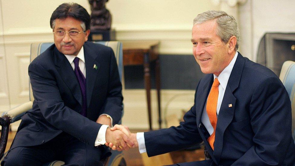 Musharraf and George W Bush shake hands in the Oval Office of the White House