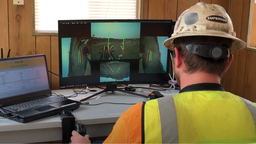 Teleo worker controlling a truck