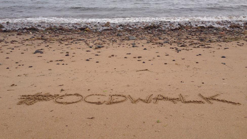 OCD Walk written in sand