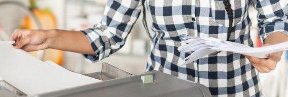 Woman photocopying