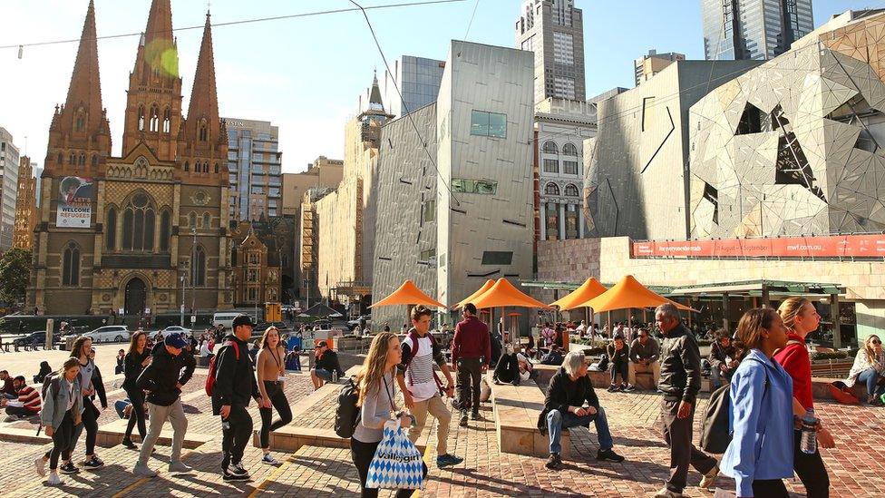 Federation Square, a popular meeting place, sits across the road from St Paul's Cathedral