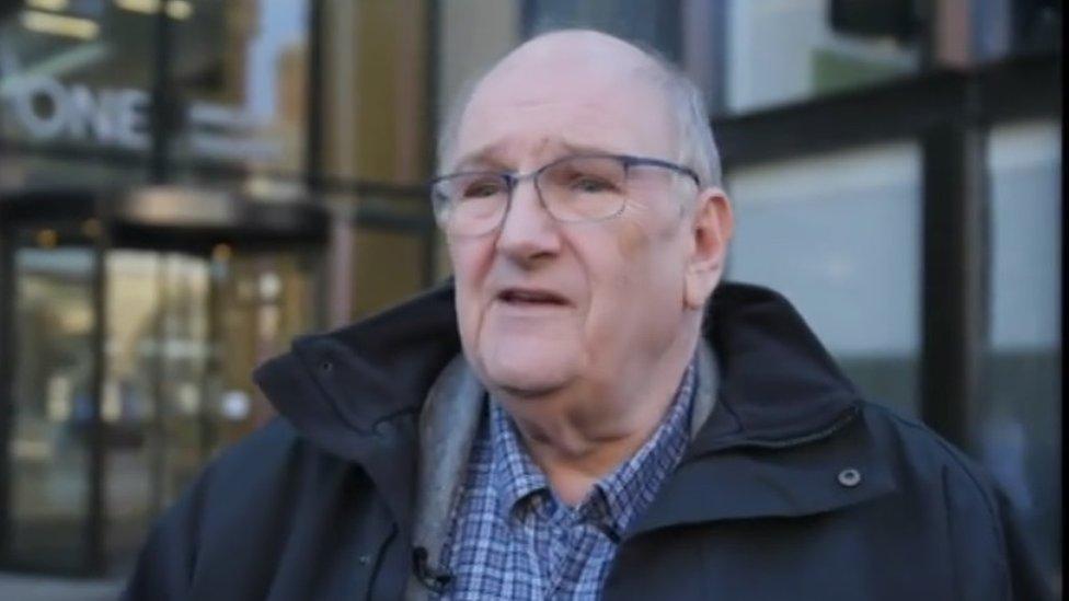 Phil Larrett wearing a blue anorak and standing outside West Northamptonshire Council's headquarters