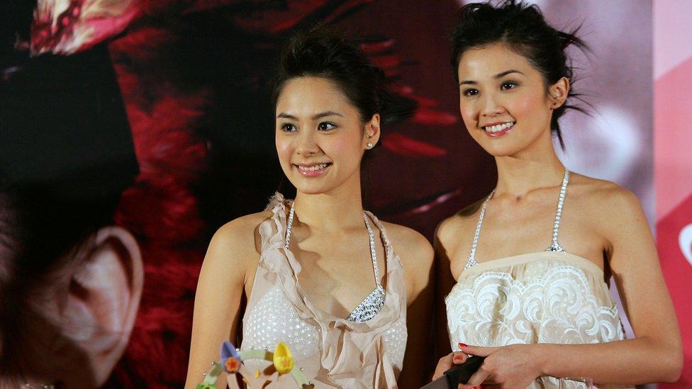 Hong Kong movie stars and canto-pop music group Twins members Gillian Chung (L) and Charlene Choi hold a press conference to promote their concert on November 21 in Hong Kong, China