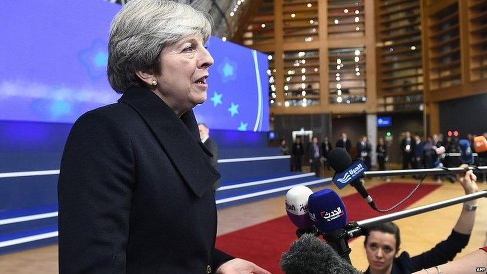 Theresa May speaking to reporters in Brussels