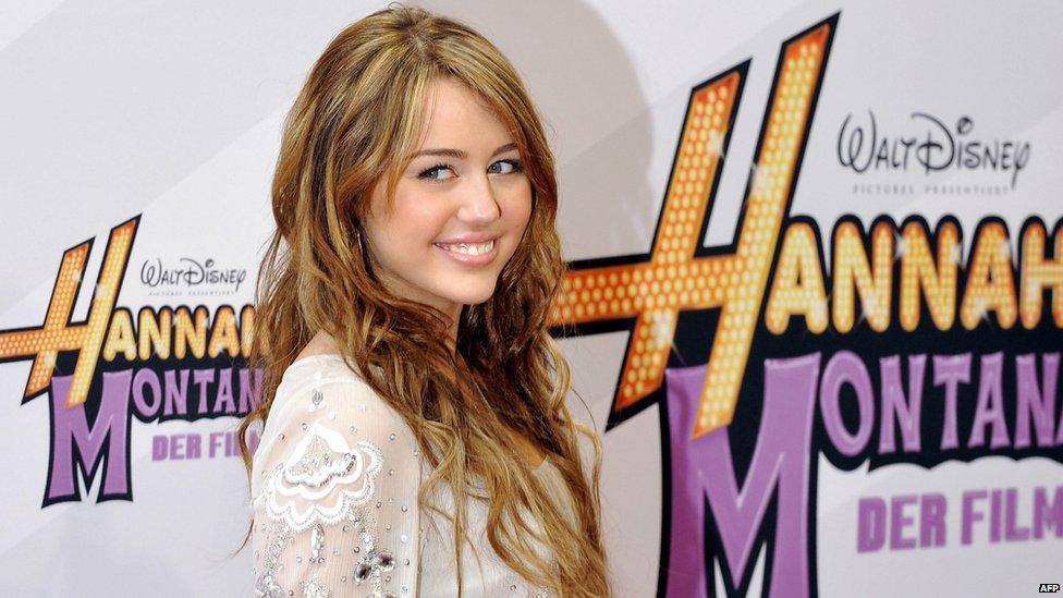 Miley Cyrus as Hannah Montana