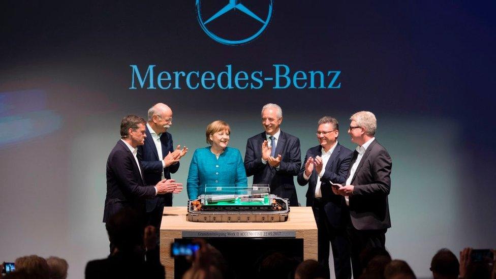 Angela Merkel with Mercedes Benz executives