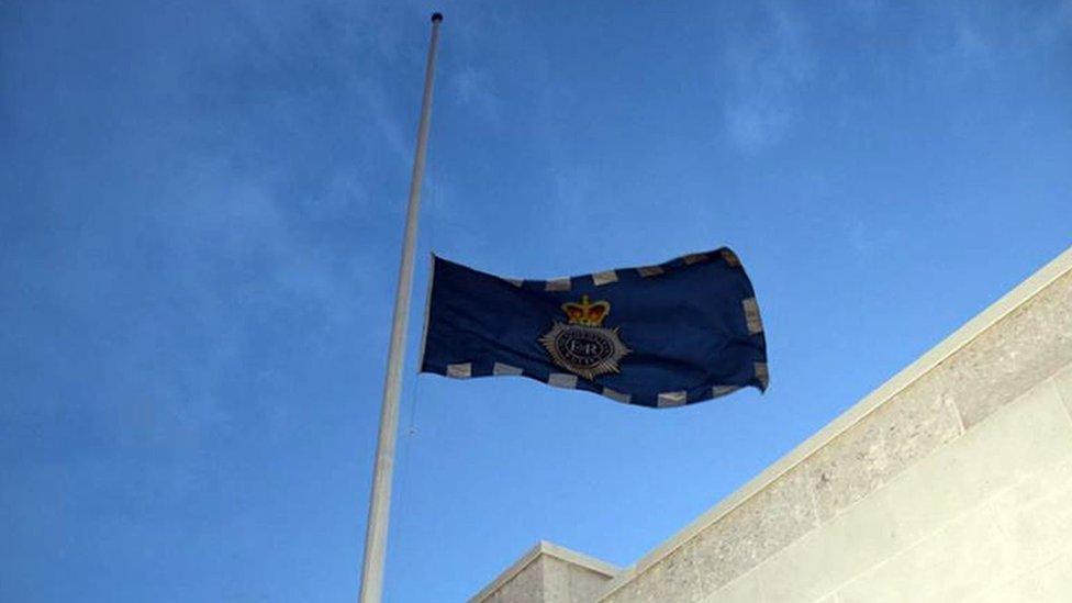 Flag at half mast outside Scotland Yard