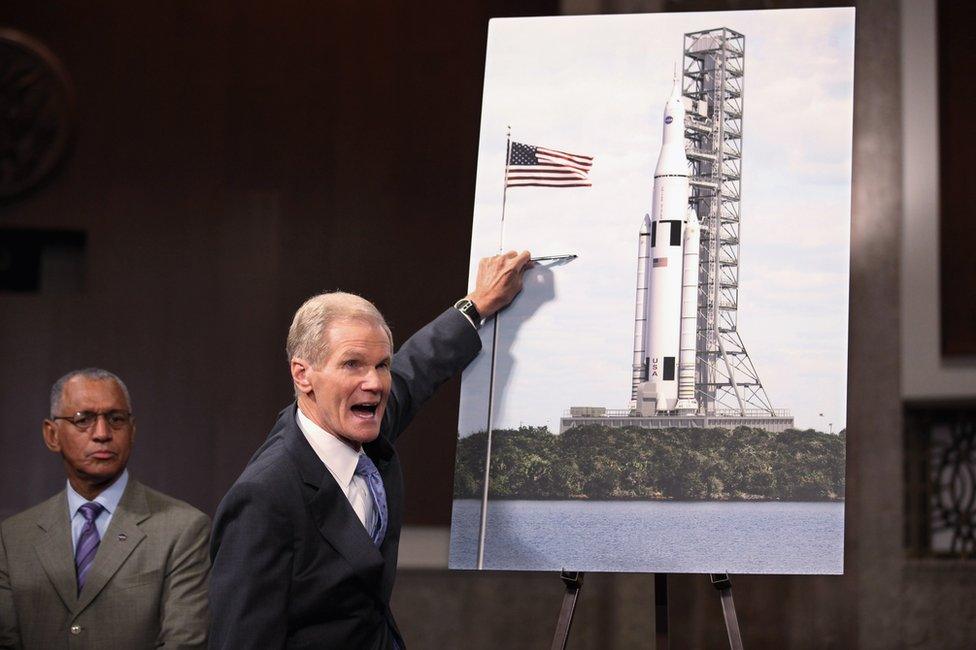 Nelson unveils the design of the SLS in 2011, as then-Nasa chief Charles Bolden looks on