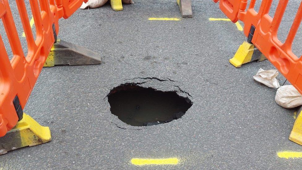 Sinkhole in road