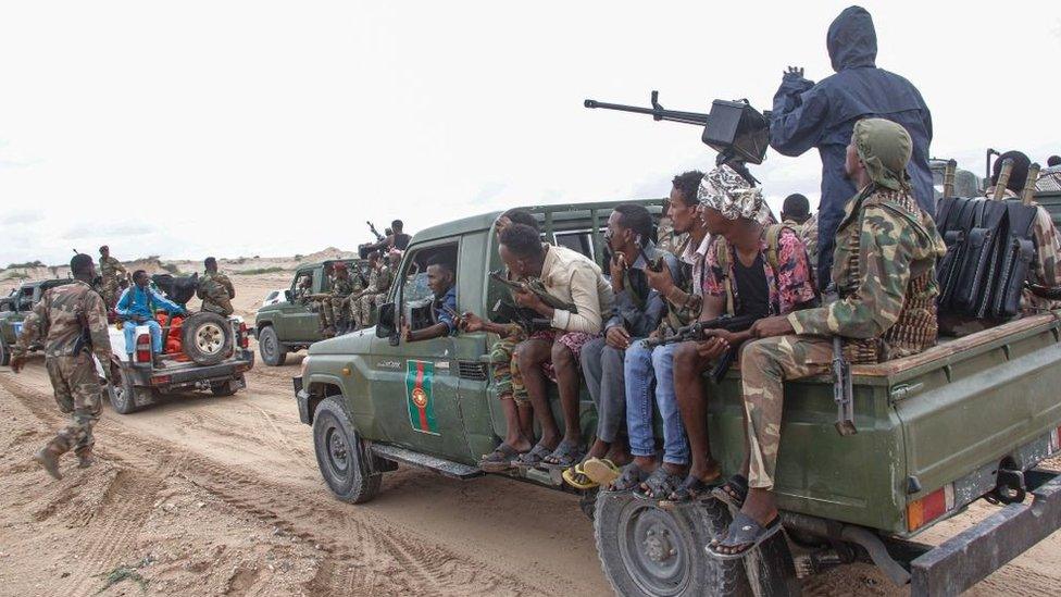 Somali military force members supporting anti-government opposition leaders gather before leaving to their bases in Mogadishu, Somalia, on May 7, 2021