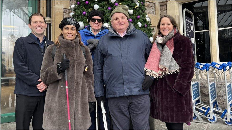 Five people standing outside Bristol Temple Meads