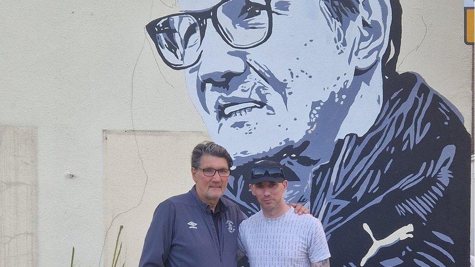 Mick Harford with Jayson Swift and the mural