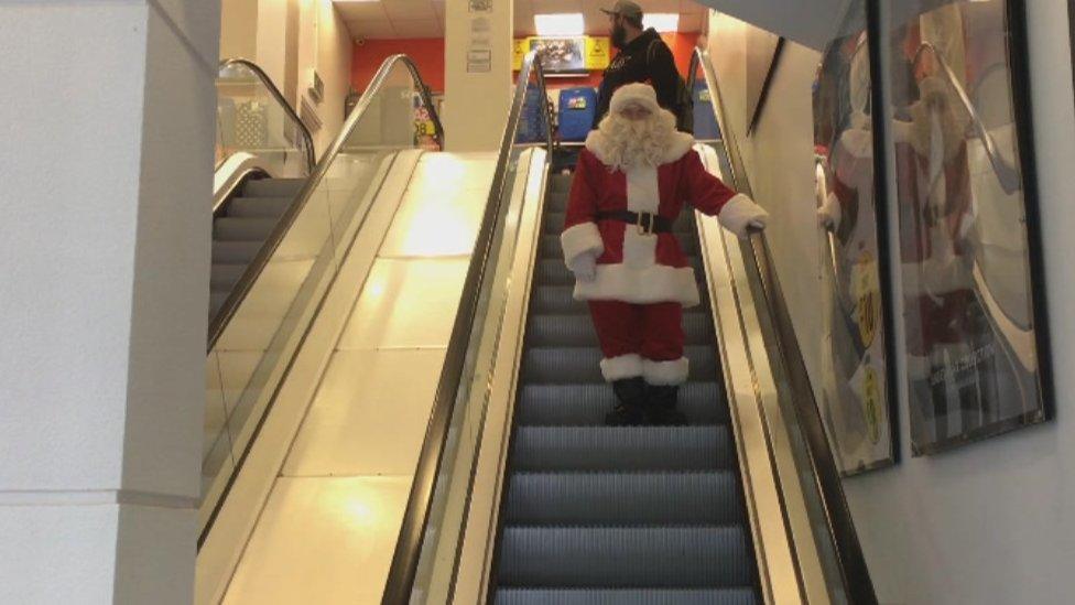 Santa Claus on an elevator