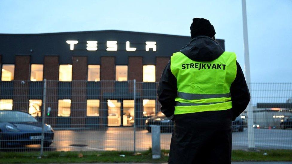 Emma Hansson, chairman of IF Metall Stockholms län stands in front of the electric car company Tesla's Service Center in Segeltorp, south of Stockholm, as workers strike for the signing of a collective agreement on October 27, 2023.