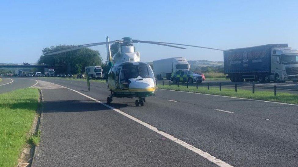 Air ambulance on motorway